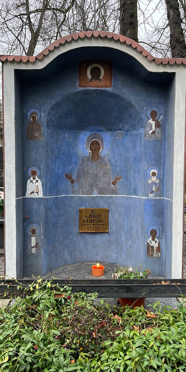 obraz nagrobka i płonąca świeca